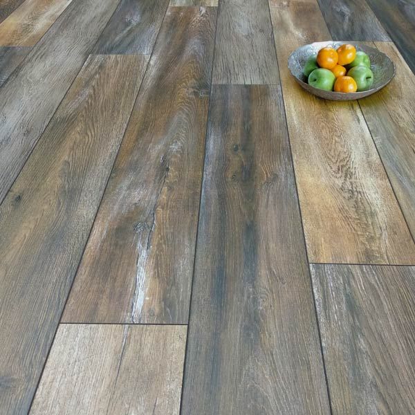 Prestige Plus 12mm Mocha Rustic Oak Ac5 Laminate Flooring 4731 Prestige Plus 12mm Mocha Rustic Oak Ac5, Textured Wood Effect Laminate Flooring Rustic Oak