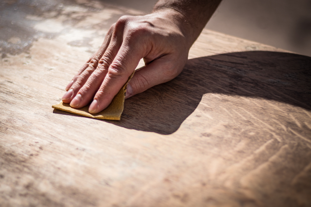 Sanding and restoring a wooden floor